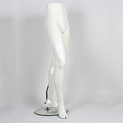 Male mannequin legs in front of a white background, side on view